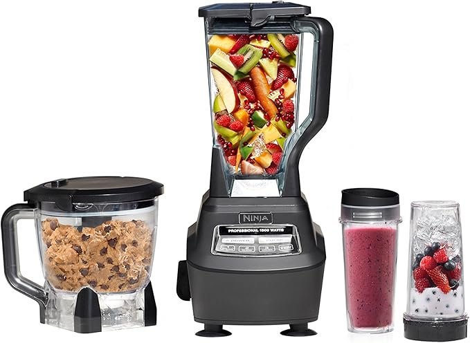 Ninja Mega Kitchen System BL770 on kitchen counter with to-go coffee cup, blender full of frappé, and crushed ice – perfect blender for iced coffee drinks and smoothies.
